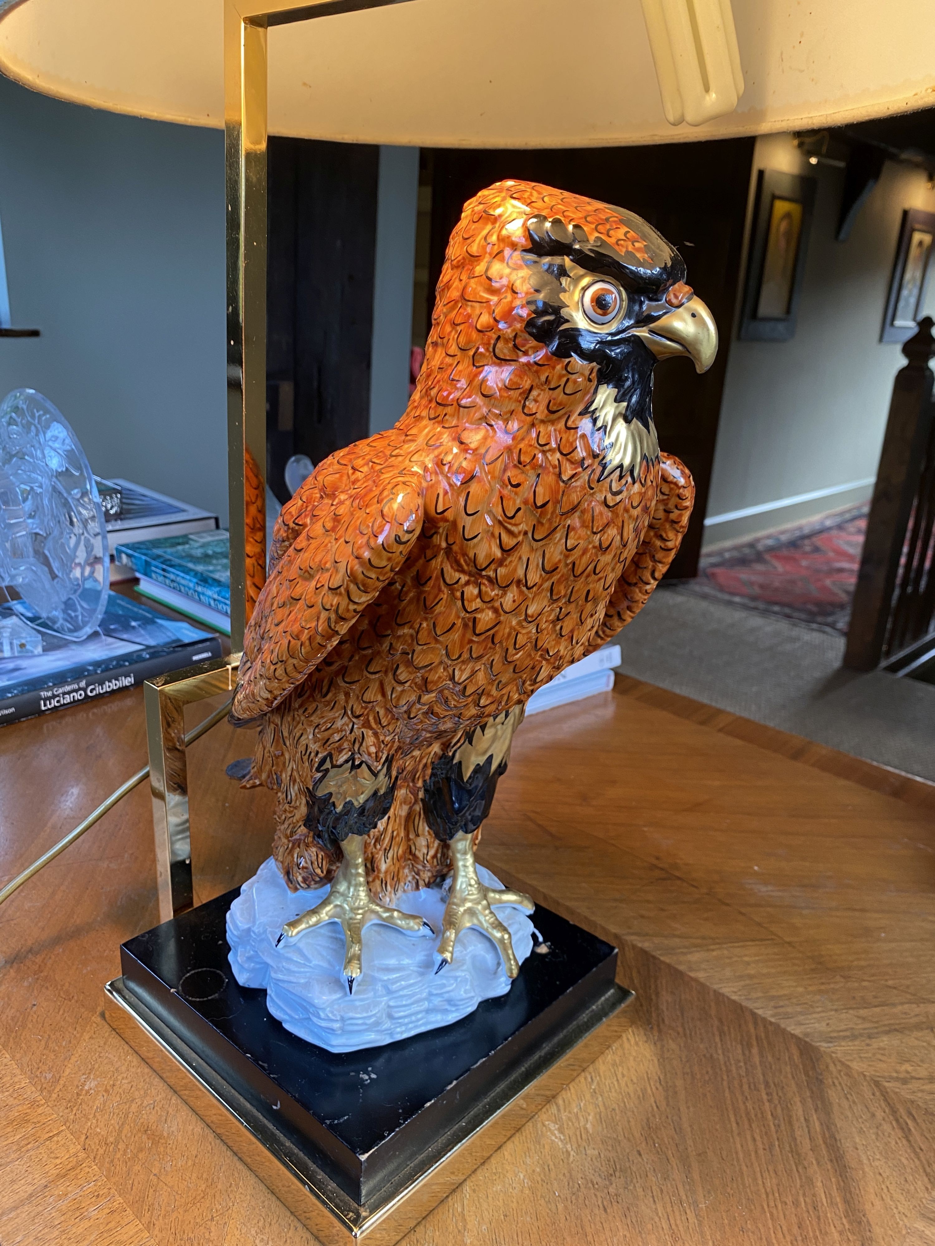 A Continental porcelain owl lamp base, with lacquered brass mounts, height of base 45cm